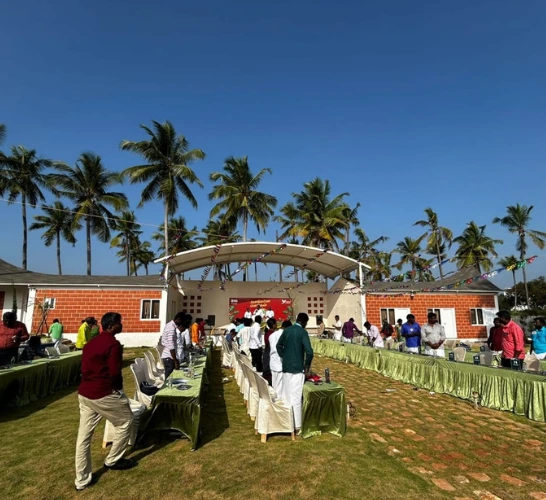 Spacious event party hall with guests and elegant seating setup near Sai Baba Colony Coimbatore.